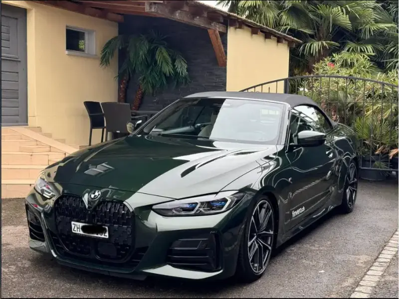 Dunkelgrünes BMW 4er Cabrio von Egloff Automobile